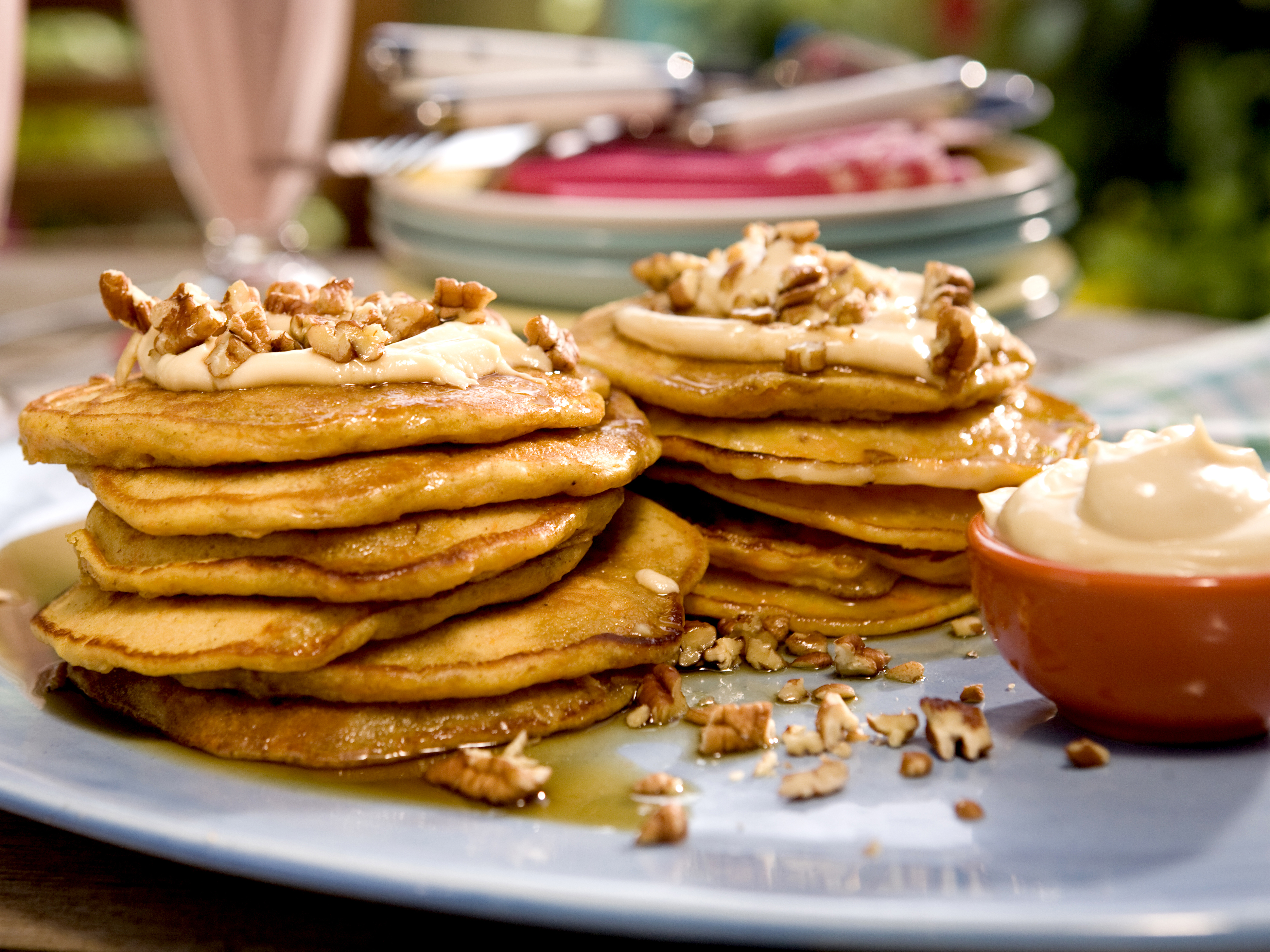 Carrot Cake Pancakes with Maple-Cream Cheese Drizzle and Toasted Pecans