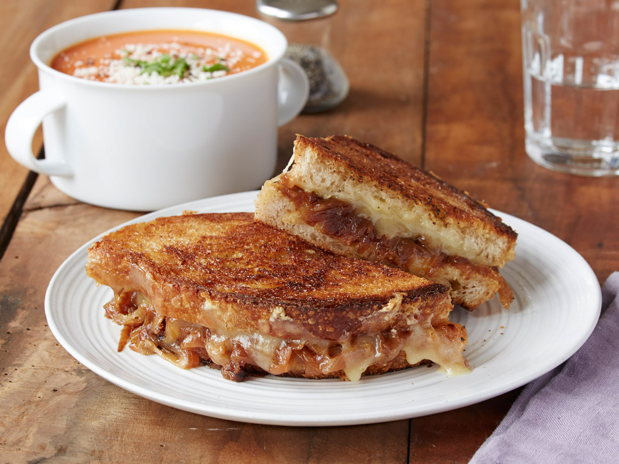 Image of Grilled Cheese with Caramelized Onions and Tomatoes